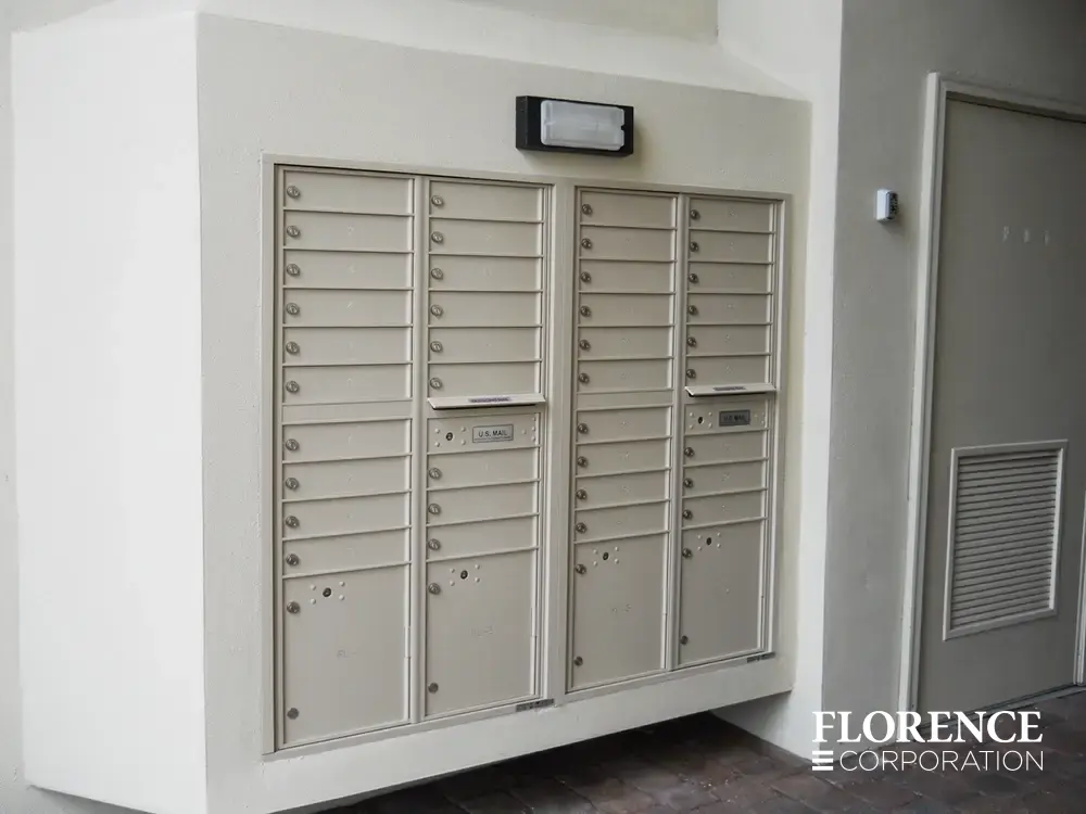 recessed mounted versatile&trade; 4C mailboxes in sandstone installed outdoor recessed in white wall