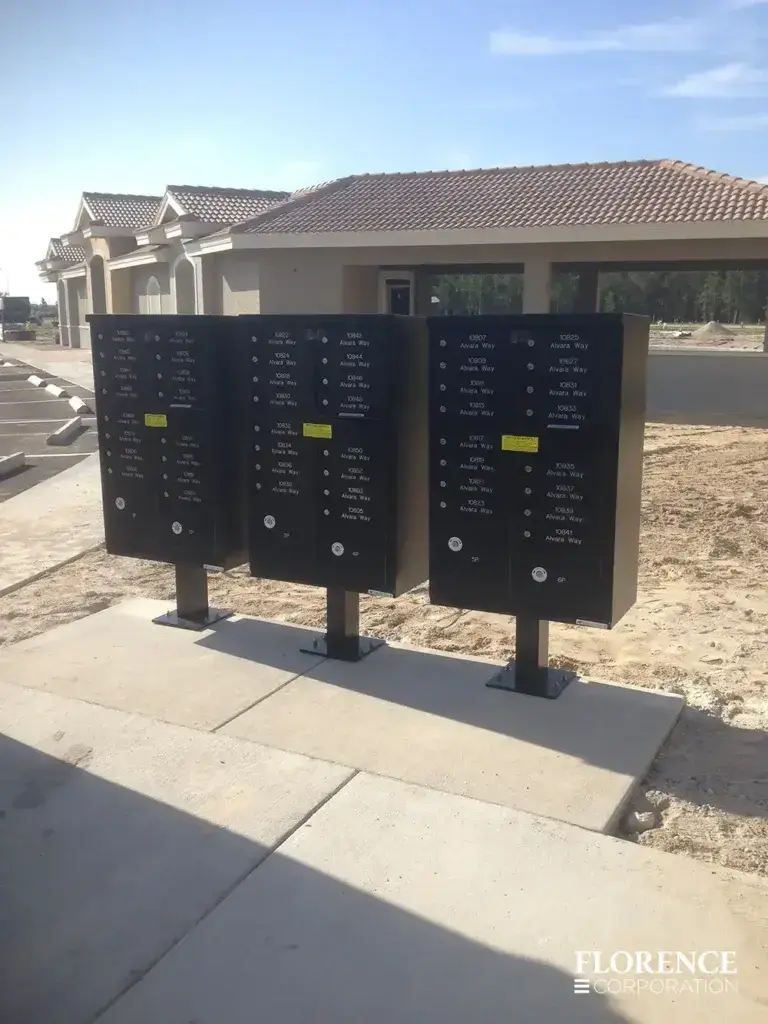 vital&trade; cluster box units in black installed on cement slab near new community rec center