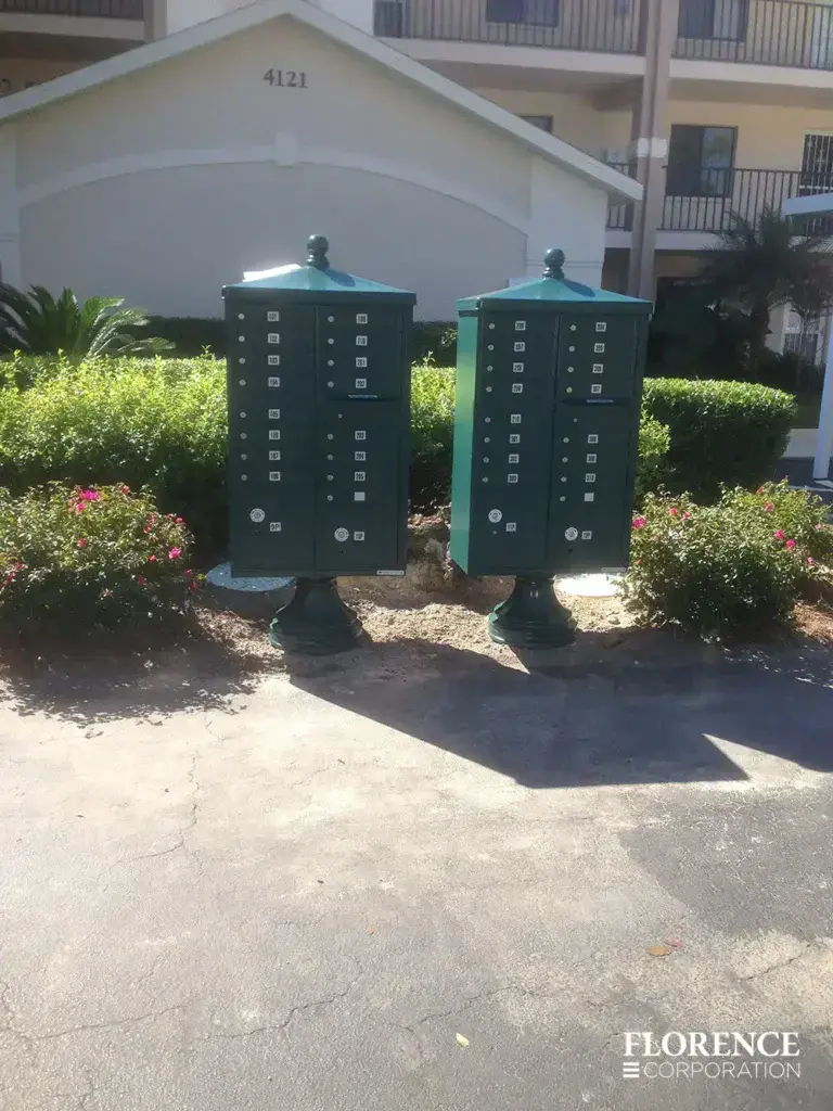 vogue-CBU-Accessories_015 vogue™ accessories on vital™ cluster box units in forest green installed near front garden area and parking lot of multifamily apartment building