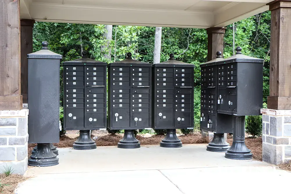 vogue-CBU-Accessories_020 vogue™ accessories on vital™ cluster box units in black installed on large concrete slab under covered gazebo