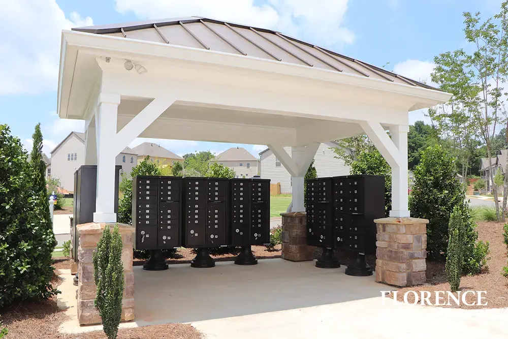 vogue-CBU-Accessories_021 vogue™ accessories on vital™ cluster box units in black installed on large concrete slab under modern chic covered gazebo to protect residents from the weather