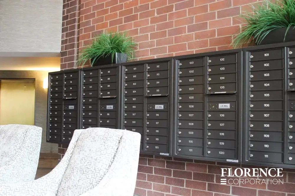 4C-versatile-surface-depot_004 surface mounted versatile™ 4C mailboxes in dark bronze mounted on red brick wall with decorative green plants