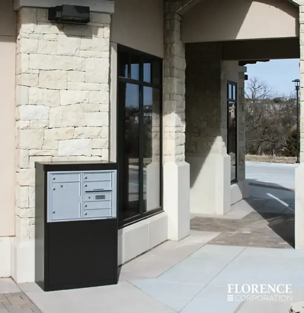 4C-versatile-surface-depot_011 versatile™ 4C mailbox installed in freestanding depot cabinet outside of stone commercial building in mid winter