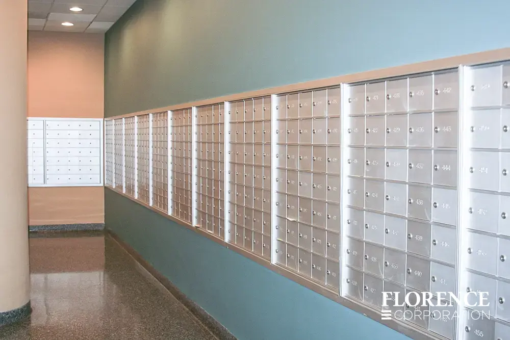 1400 Series 4B+ horizontal mailboxes in anodized aluminum installed recessed mounted in mailroom lobby of multifamily hi-rise building in downtown Chicago